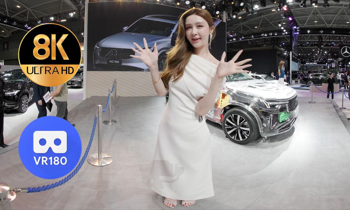 Models at the booth of Volvo cover