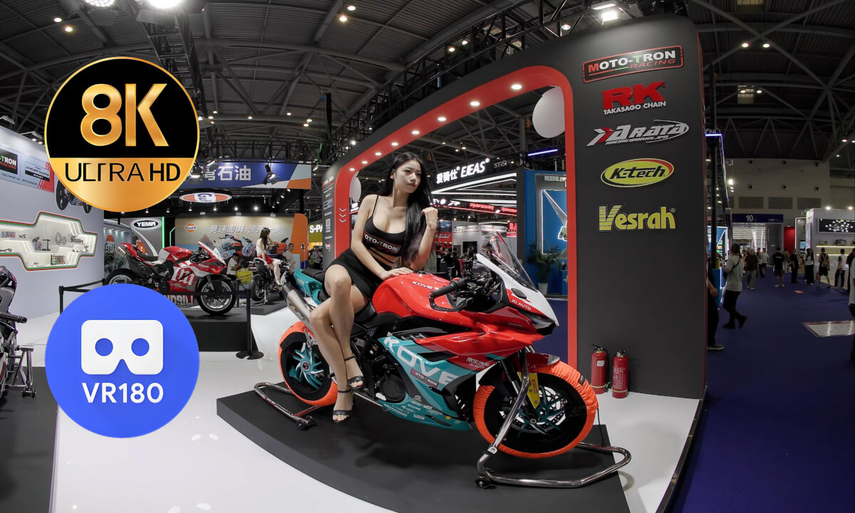 Two model girls at MOTO-TRON booth at CIMAMotor 2025 cover