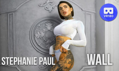 Sexy tattooed model posing against the wall VR Video Sexy tattooed model posing against the wall VR